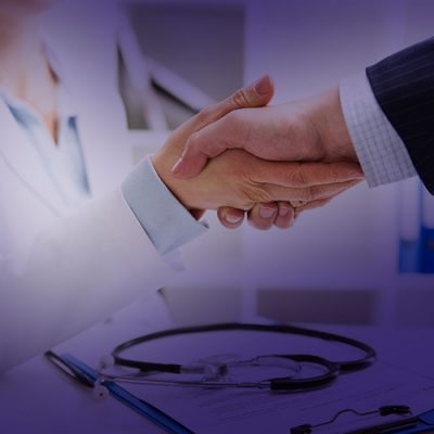 doctor-shanking-hands-business-man